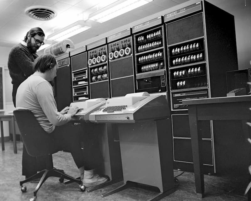 Ken Thompson And Dennis Ritchie Working on developing UNIX operating system on PDP 11 computer.